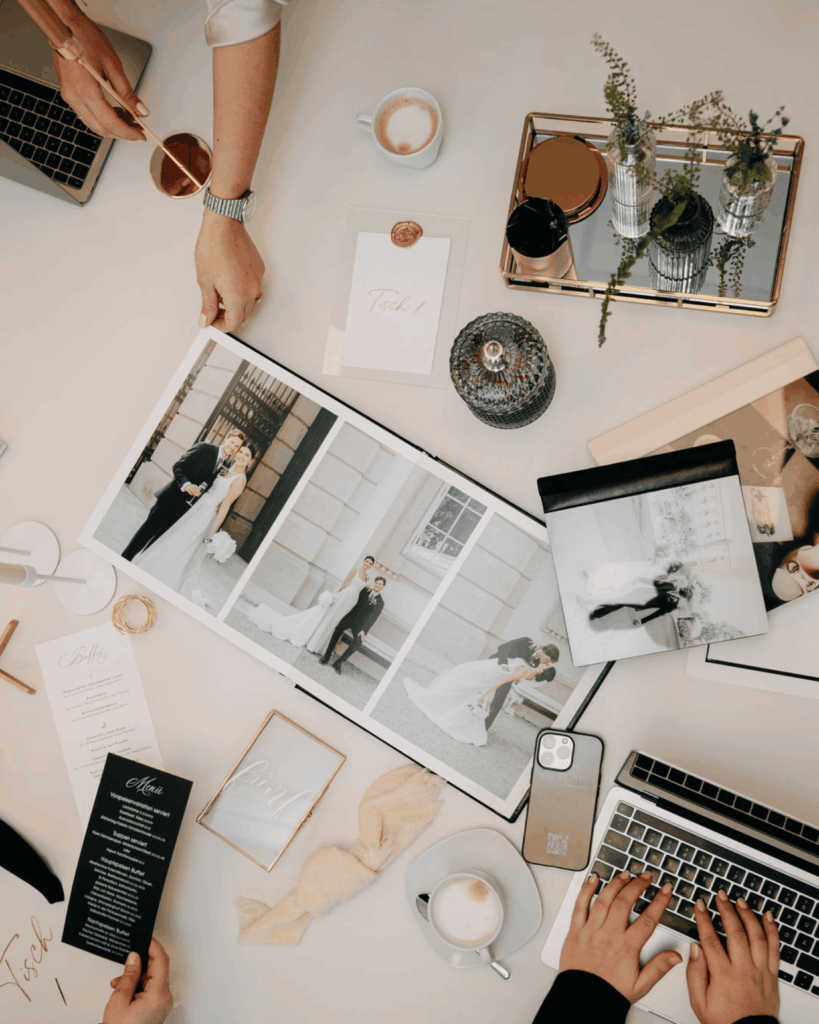 Wedding planners discussing a wedding concept at a table